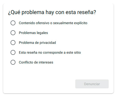 Formulario de Google My Business para denunciar una reseña indicando el motivo, como contenido ofensivo, problemas legales, privacidad o conflicto de intereses.